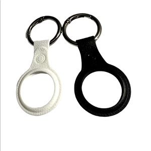 Air tag holders, 2 pack, new, black & white,